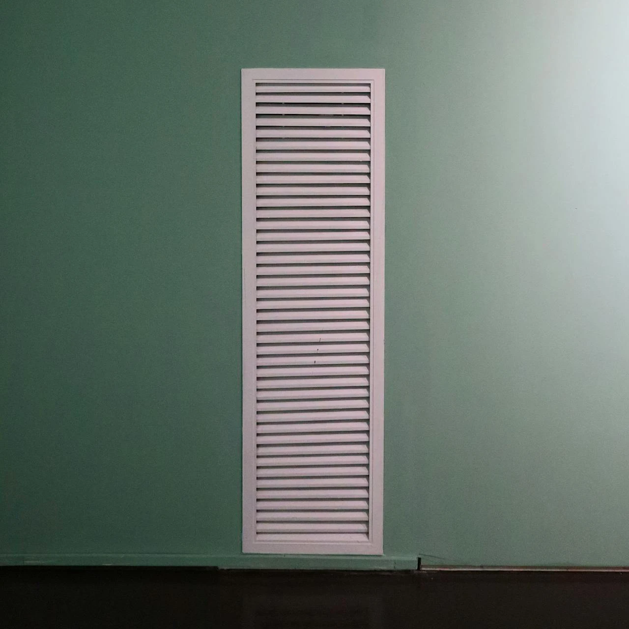 Exterior vents on the side of a house showing outdoor ventilation and airflow pathways