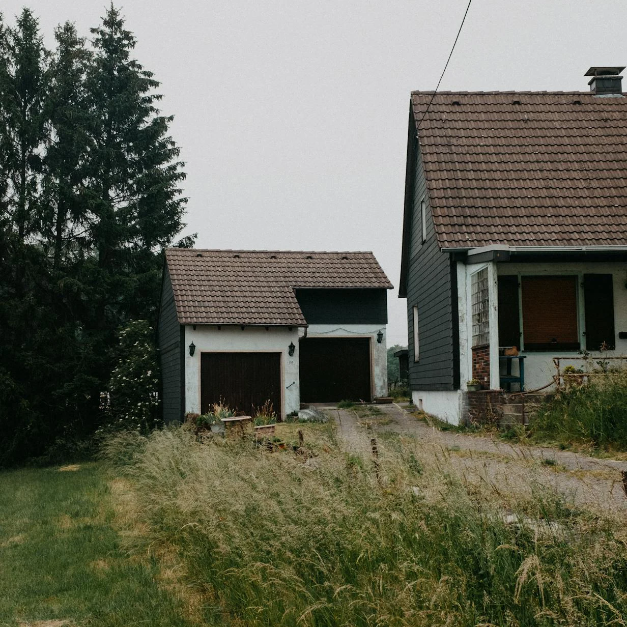 Vacant home exterior with closed blinds representing leaving a house unoccupied for three months and securing the property